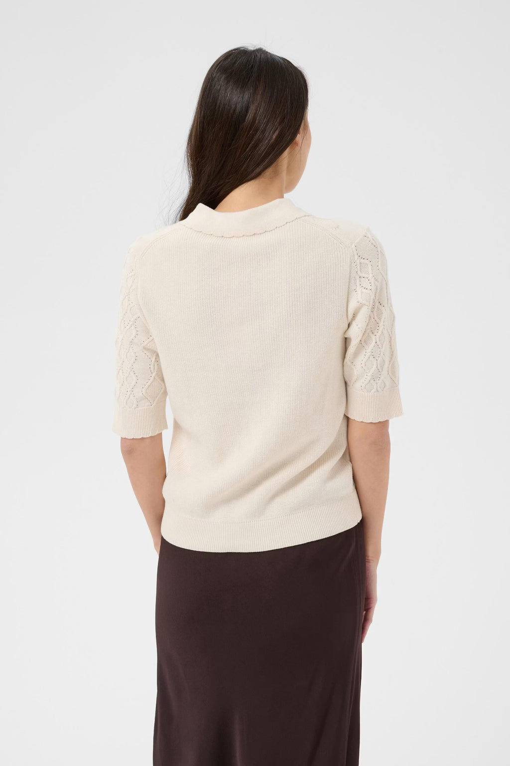 Shop the Part Two CiniaPW Knitted Jumper in French Oak Melange at Dotique. A soft relaxed-fit knit with a timeless crew neck, perfect for effortless everyday style.