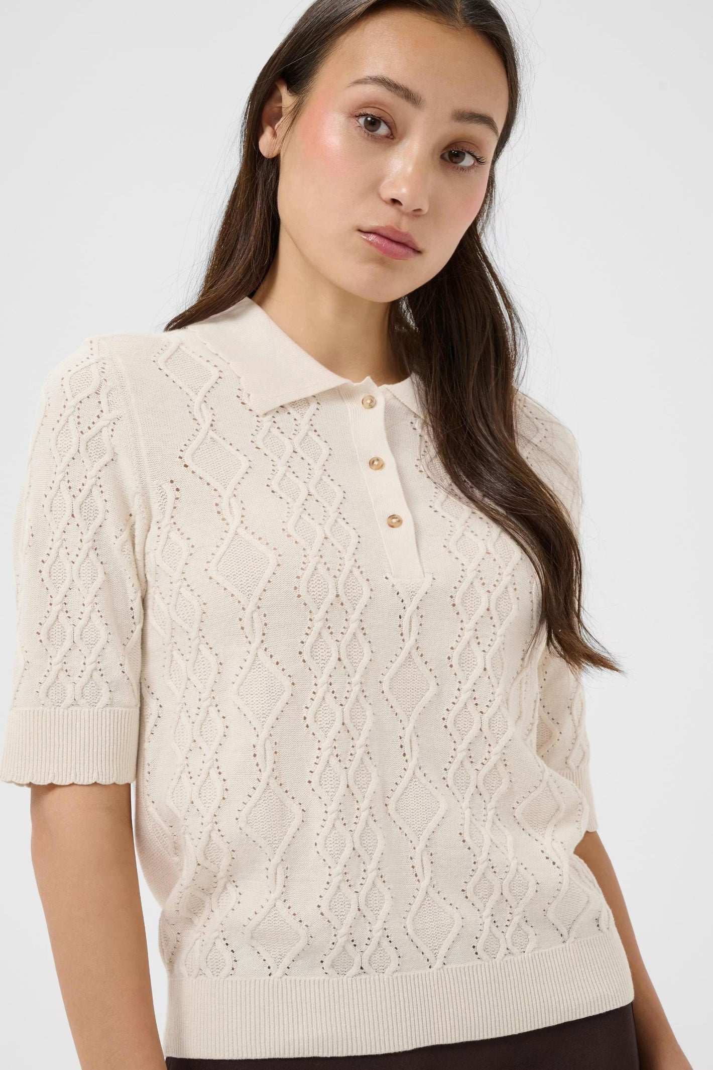 Shop the Part Two CiniaPW Knitted Jumper in French Oak Melange at Dotique. A soft relaxed-fit knit with a timeless crew neck, perfect for effortless everyday style.