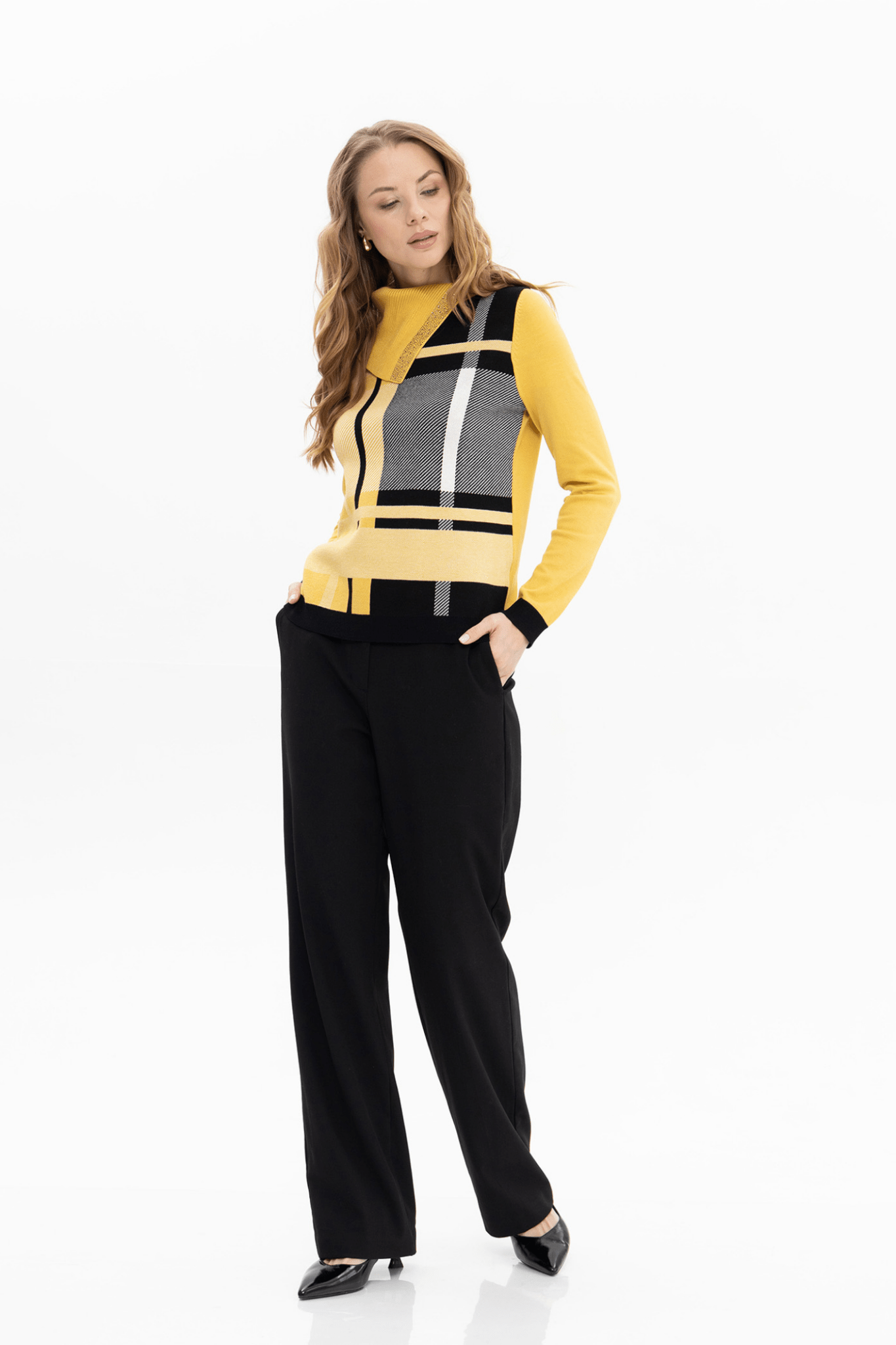 Passioni 18150 jumper in a striking yellow, black, and white check design. Available at Dotique