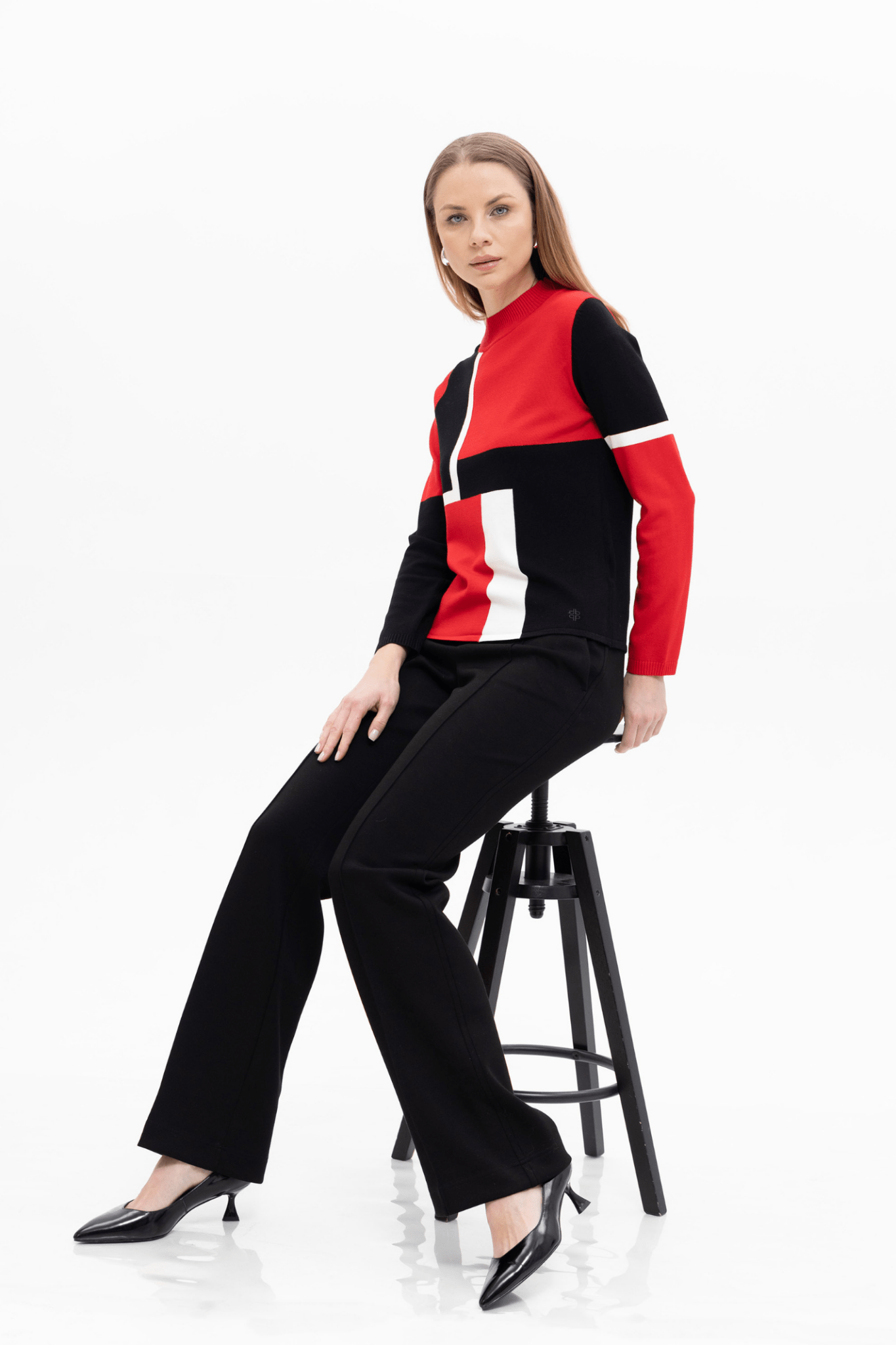  Passioni 18230 Red, Black, and White Block Jumper. Featuring striking colour block panels with a mock neck and comfortable fit. 