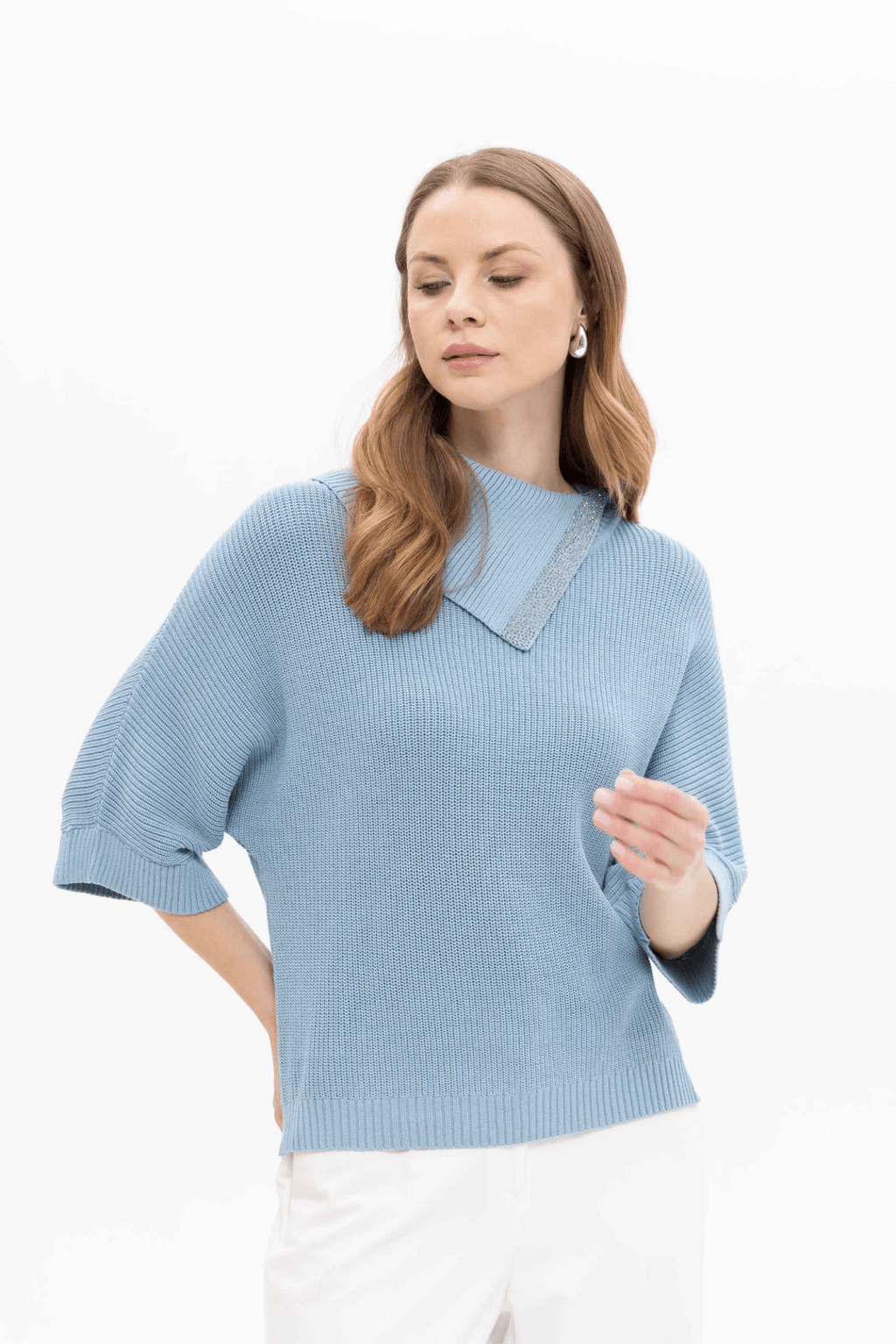 Passioni 18252 Blue High Neck Jumper. Featuring a stylish fold-over high neckline with subtle sparkle trim, this jumper is crafted from a comfortable blend of 65% viscose, 20% polyamide, and 15% polyester.