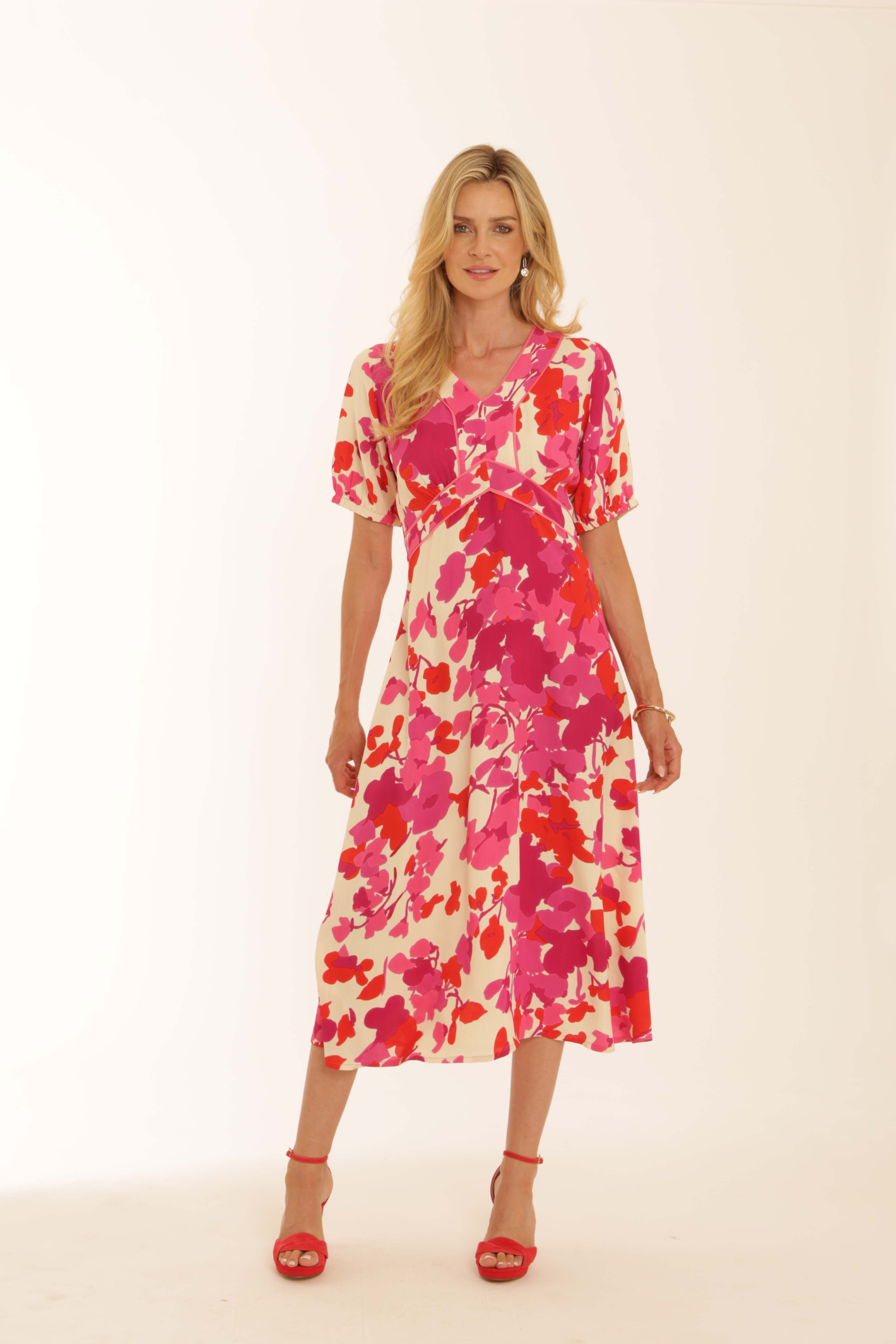 Woman wearing Pomodoro 62625 Trailing Flower Tea Dress Pink by pomodoro, shop pomodoro at Dotique in vibrant floral print
