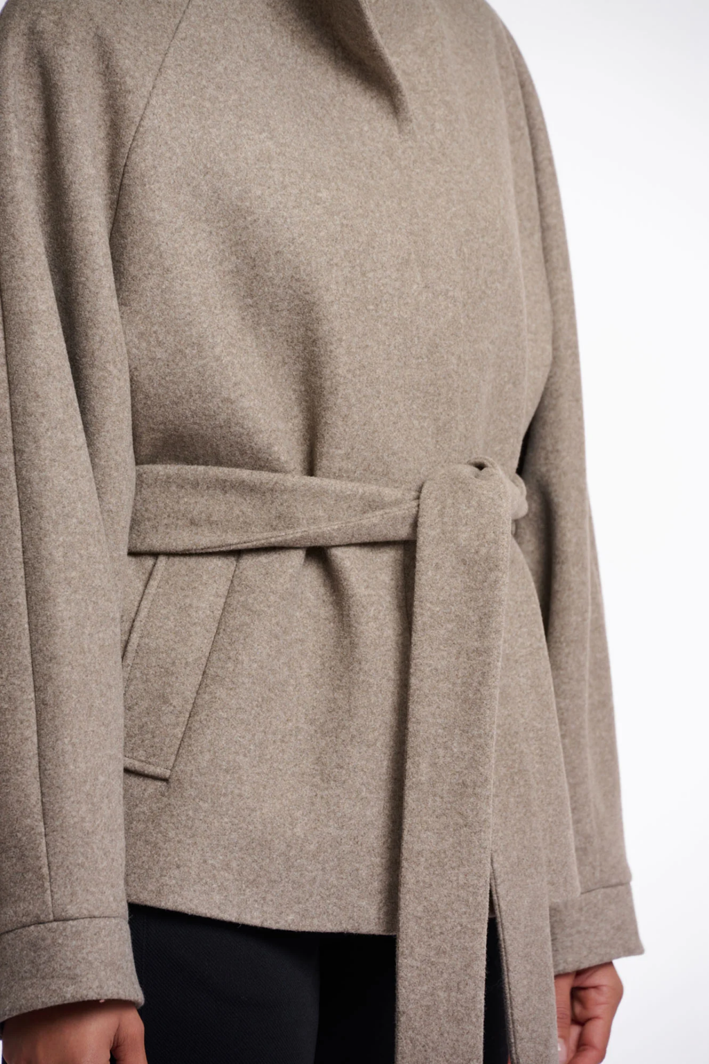 Shop the Rino & Pelle Cornelia Jacket in Toffee Melange at Dotique. A soft lightweight jacket with a belted waist, button front and side pockets.