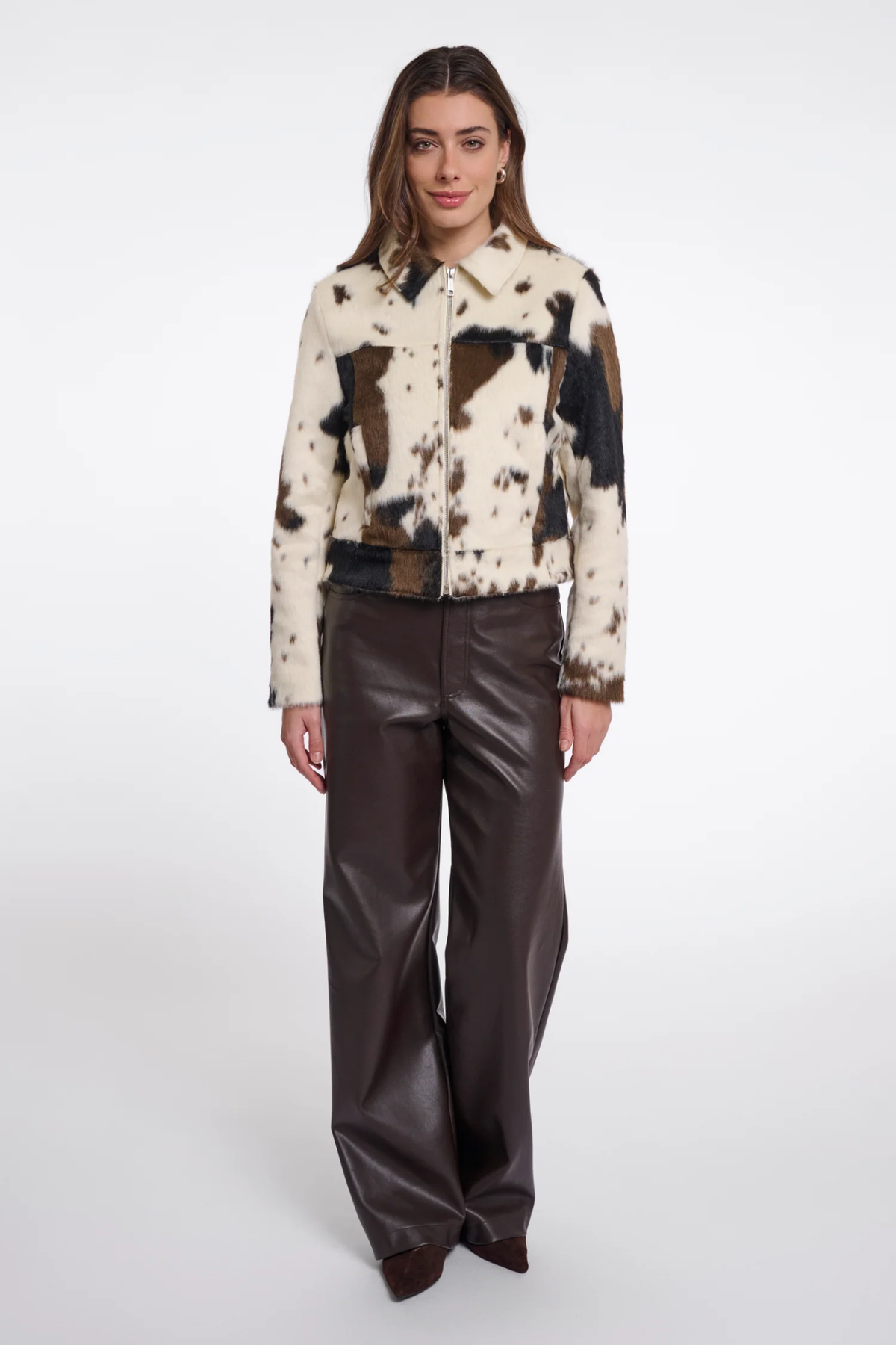 Shop the Rino & Pelle Touka Cow Print Jacket at Dotique. A statement cow-print jacket with a faux-leather look and easy zip-front shape.