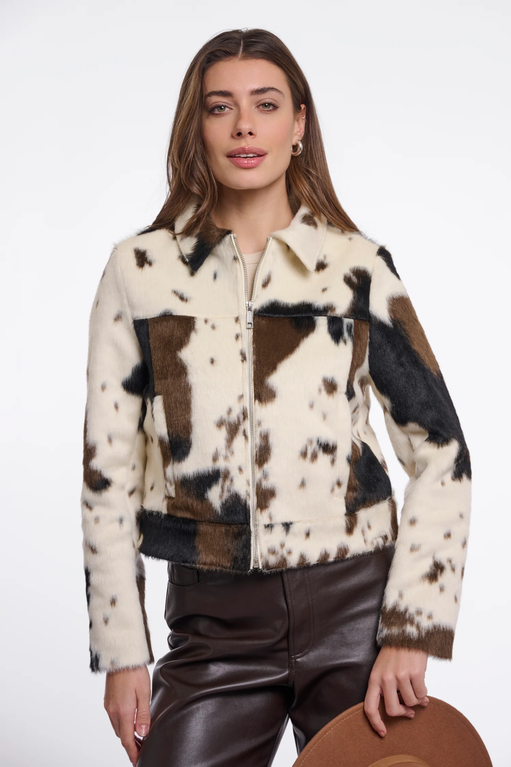 Shop the Rino & Pelle Touka Cow Print Jacket at Dotique. A statement cow-print jacket with a faux-leather look and easy zip-front shape.