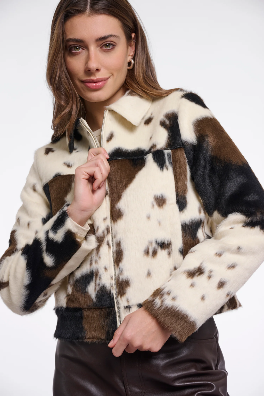 Shop the Rino & Pelle Touka Cow Print Jacket at Dotique. A statement cow-print jacket with a faux-leather look and easy zip-front shape.