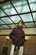 Shop the Rino & Pelle Cornelia Jacket in Chocolate Bean at Dotique. A soft dark brown belted jacket with a button front and side pockets.