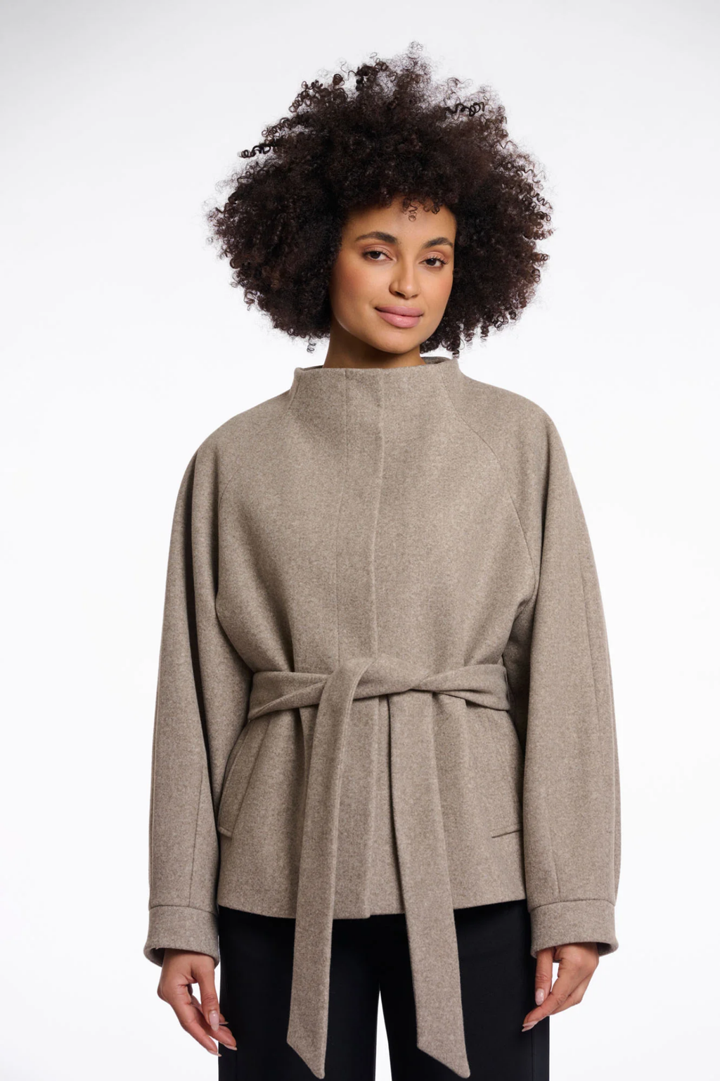 Shop the Rino & Pelle Cornelia Jacket in Toffee Melange at Dotique. A soft lightweight jacket with a belted waist, button front and side pockets.