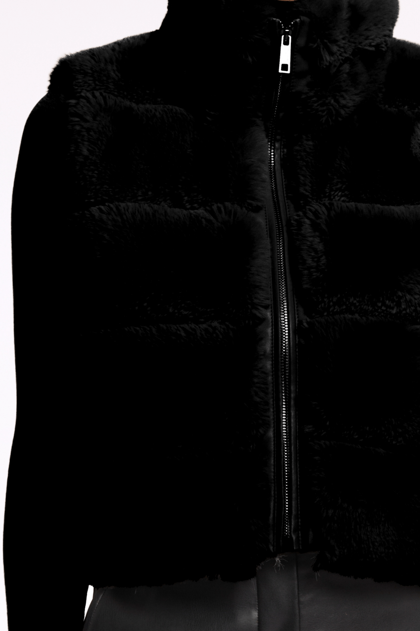 Black puffer jacket with a zipper on a white background