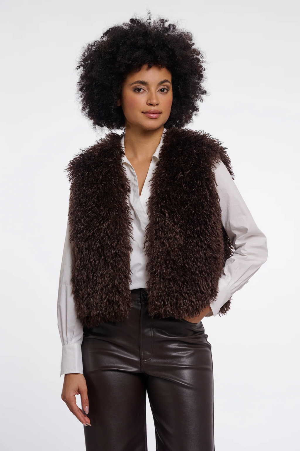 Shop the Rino & Pelle Sensy Faux Fur Waistcoat in Coffee Roast at Dotique. A soft brown faux fur gilet with a relaxed fit, perfect for autumn layering.