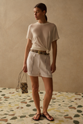 Sancia Rory Shorts in ivory with tailored fit and contrast stitching. Lightweight cupro fabric. Shop now at Dotique.