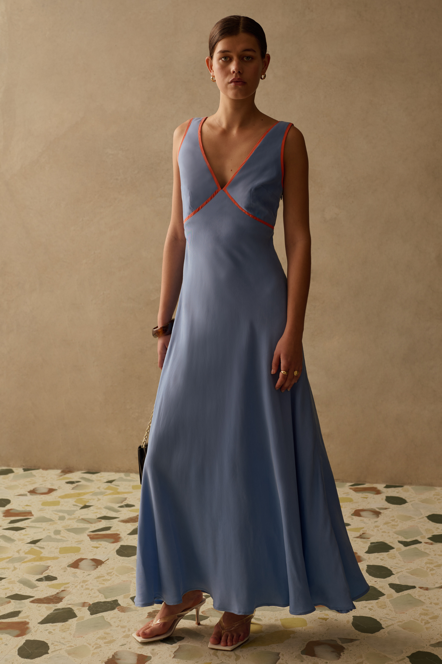 Elegant Pacific Blue dress by Sancia with soft waist shaping and flowing skirt. Lightweight cupro for effortless summer dressing. Shop at Dotique.