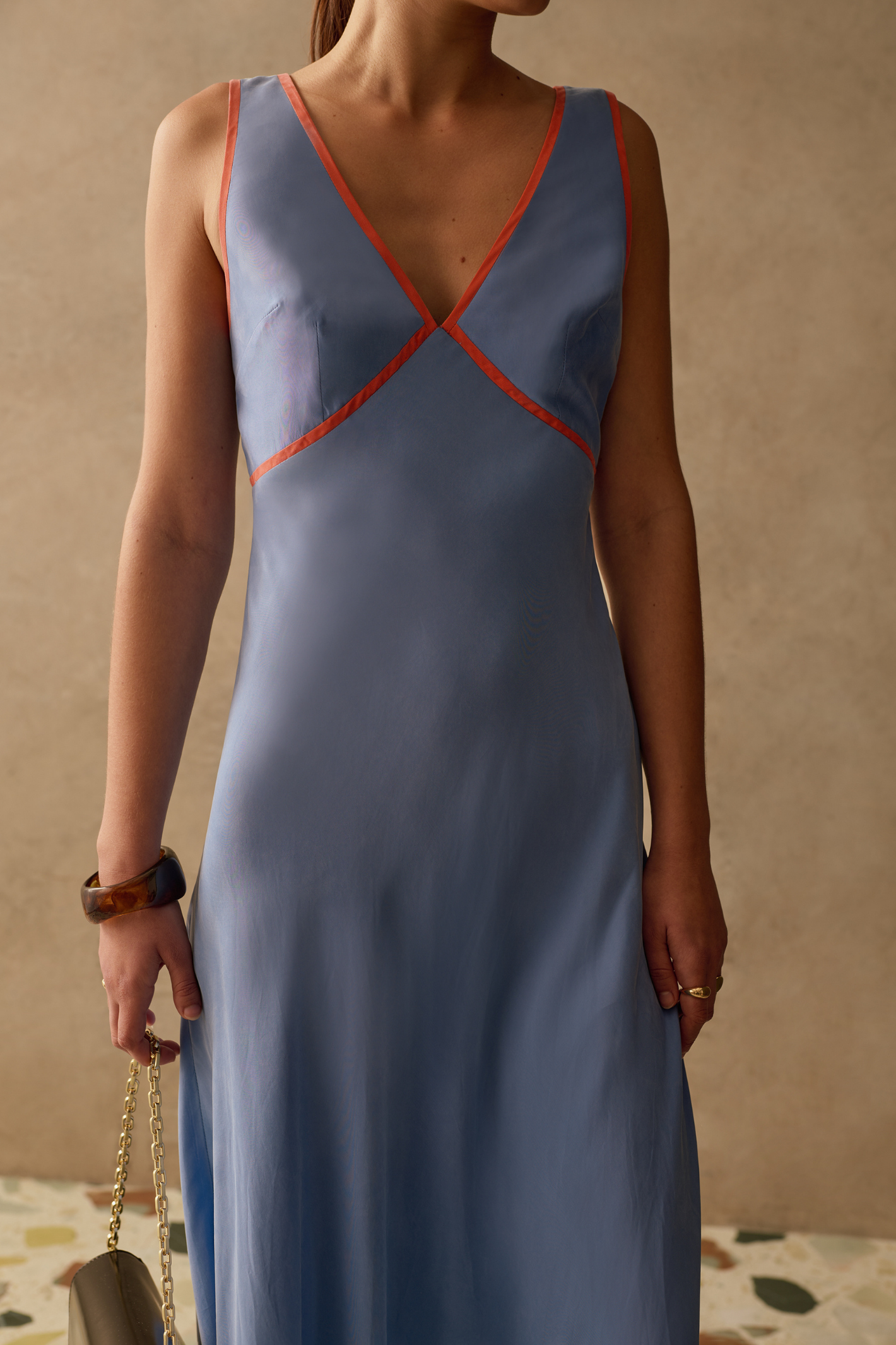 Elegant Pacific Blue dress by Sancia with soft waist shaping and flowing skirt. Lightweight cupro for effortless summer dressing. Shop at Dotique.