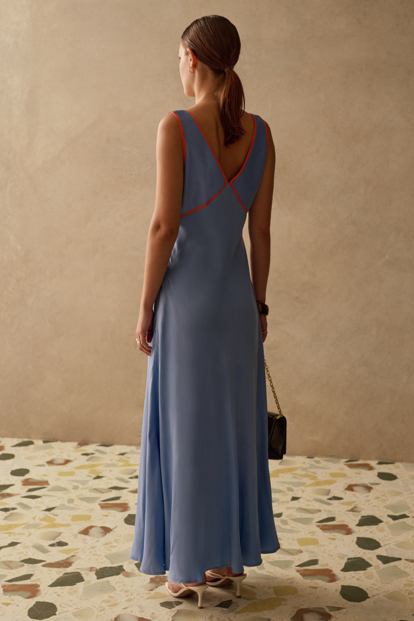Elegant Pacific Blue dress by Sancia with soft waist shaping and flowing skirt. Lightweight cupro for effortless summer dressing. Shop at Dotique.