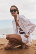 Ivory shirt by Sancia with contrast stitching and a relaxed fit. Lightweight, easy to wear and perfect for everyday styling. Shop now at Dotique.