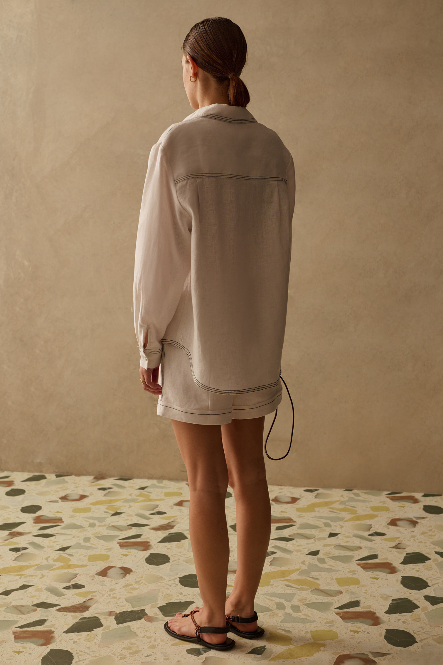 Ivory shirt by Sancia with contrast stitching and a relaxed fit. Lightweight, easy to wear and perfect for everyday styling. Shop now at Dotique.