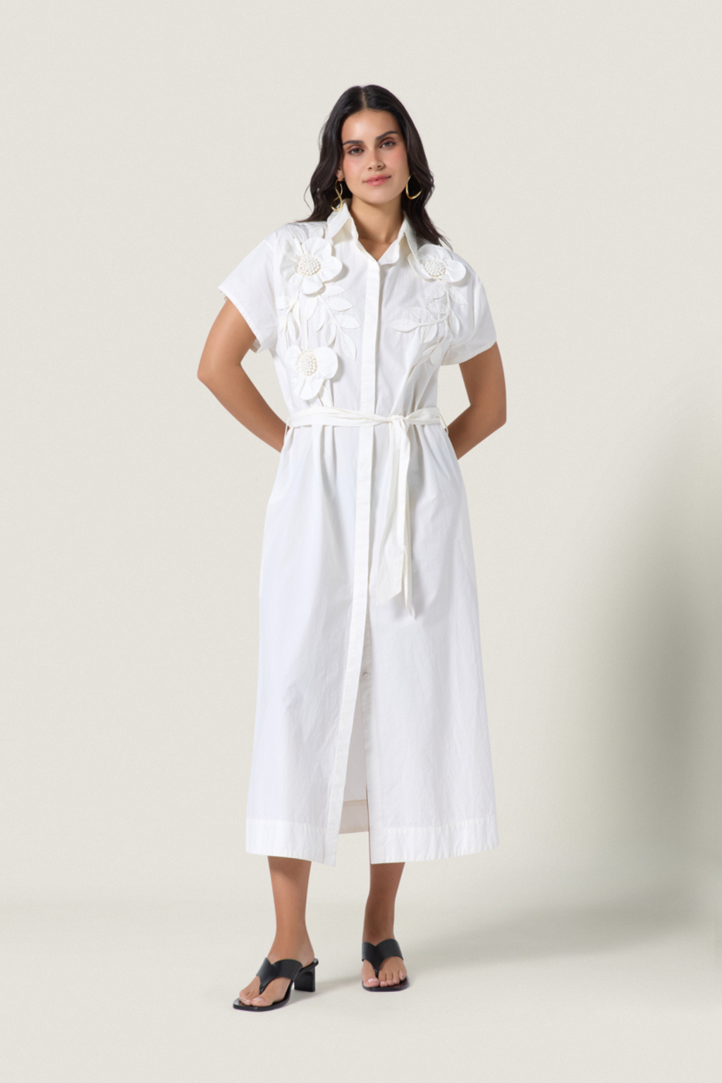 Model wearing a white Scarlett Poppies Saelina Dress Papyrus by Scarlett Poppies, shop Scarlett Poppies at Dotique