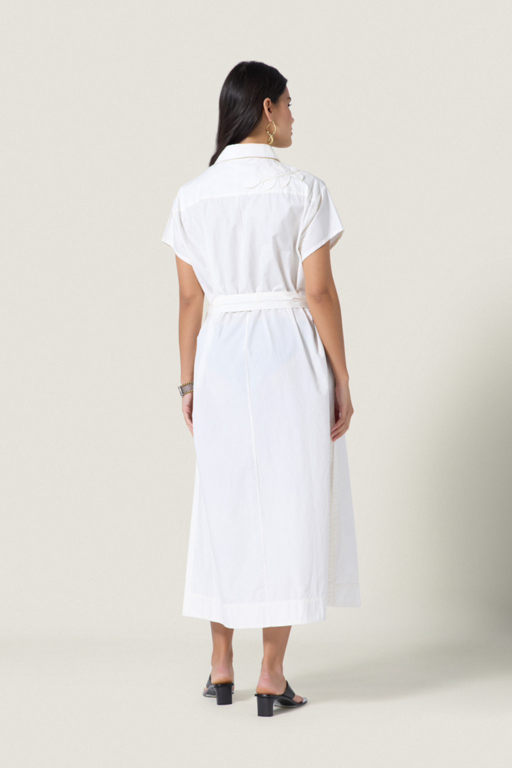 Woman wearing Scarlett Poppies Saelina Dress Papyrus viewed from back, shop Scarlett Poppies at Dotique.