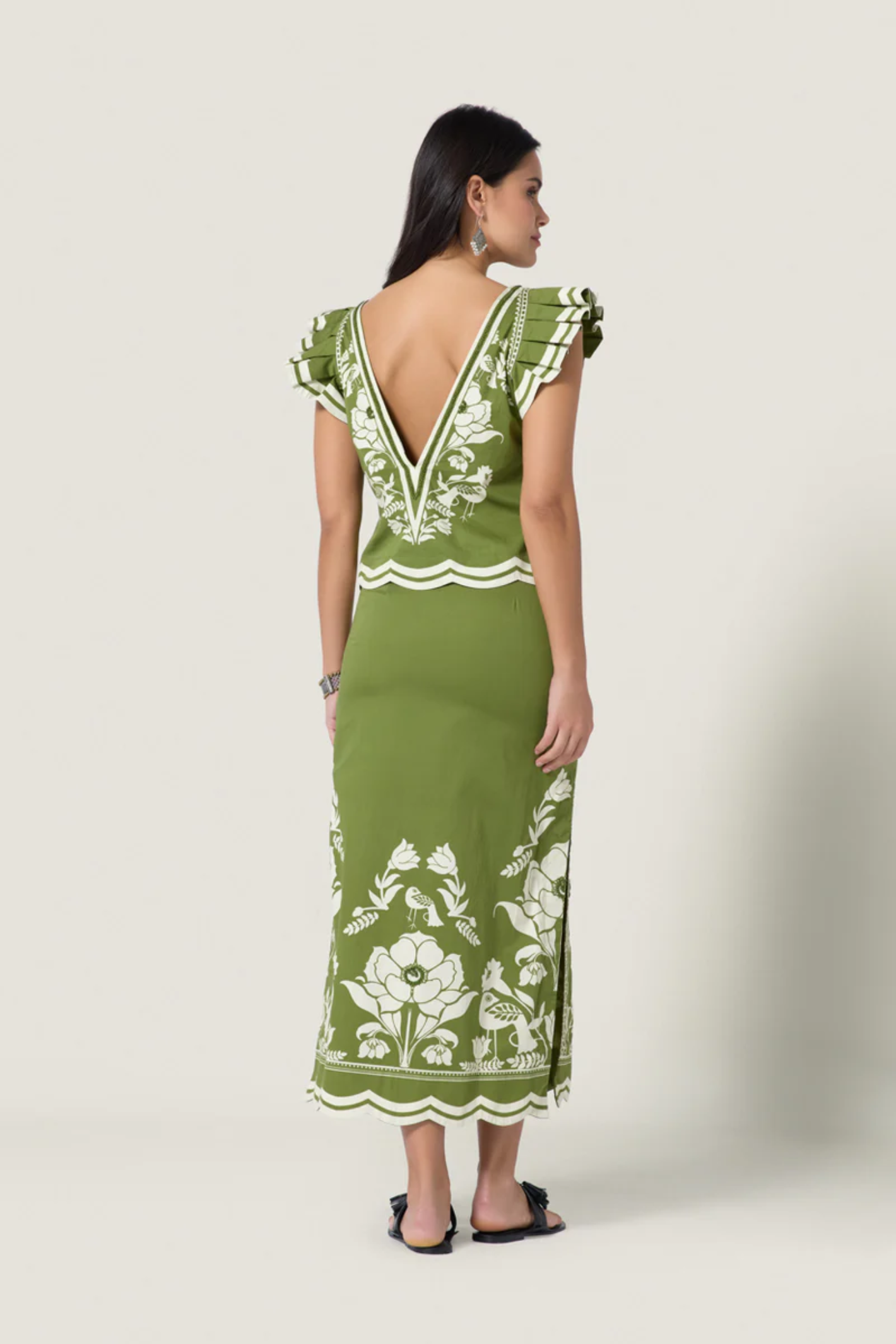 Woman wearing Scarlett Poppies Vittore Top Calla Green/Papyrus by Scarlett Poppies, shop Scarlett Poppies at Dotique.