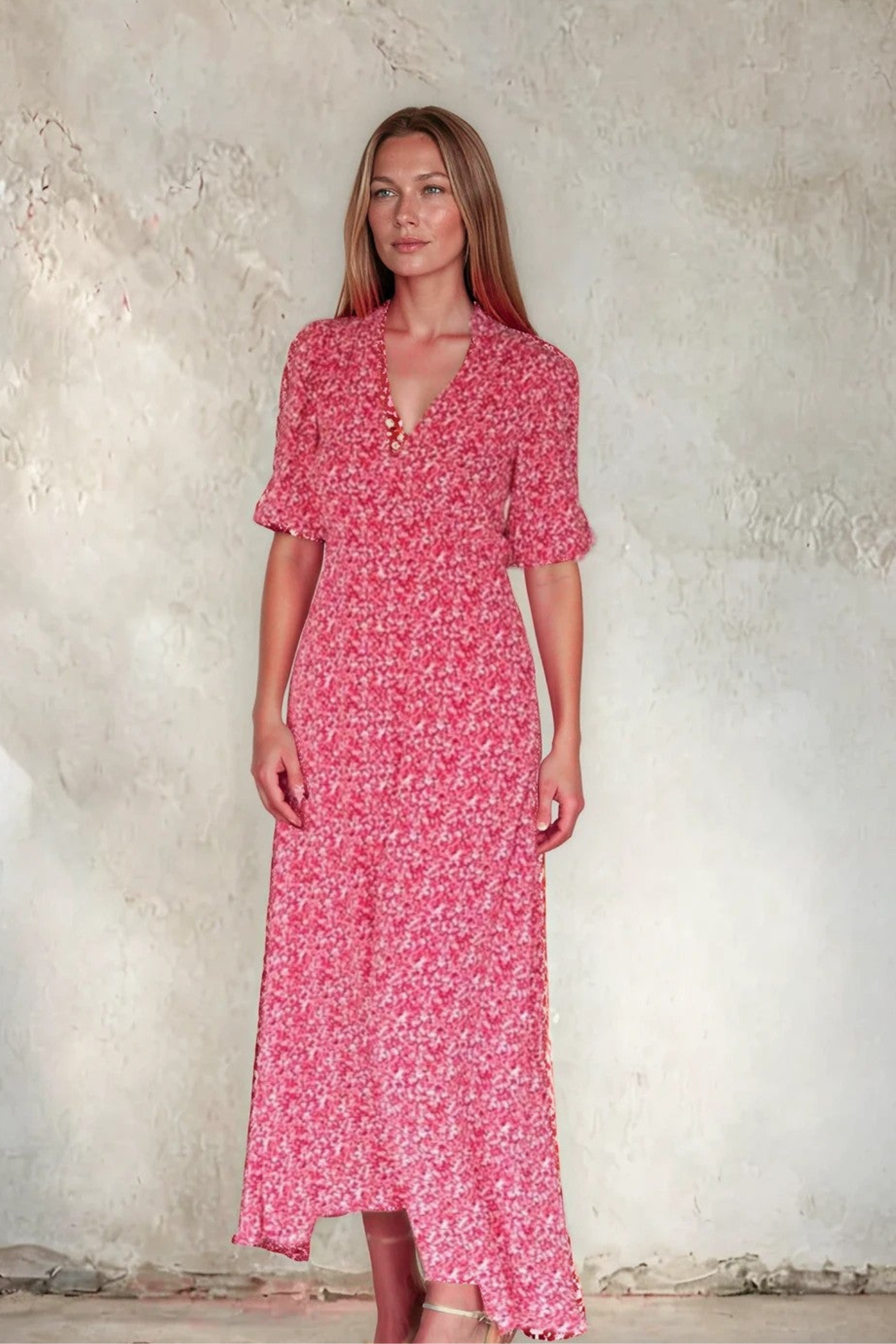 Front view of a model wearing Sirens Elena Red Ditsy Print Dress with subtle floral pattern and mid-length sleeves by Sirens. Shop Sirens at Dotique.
