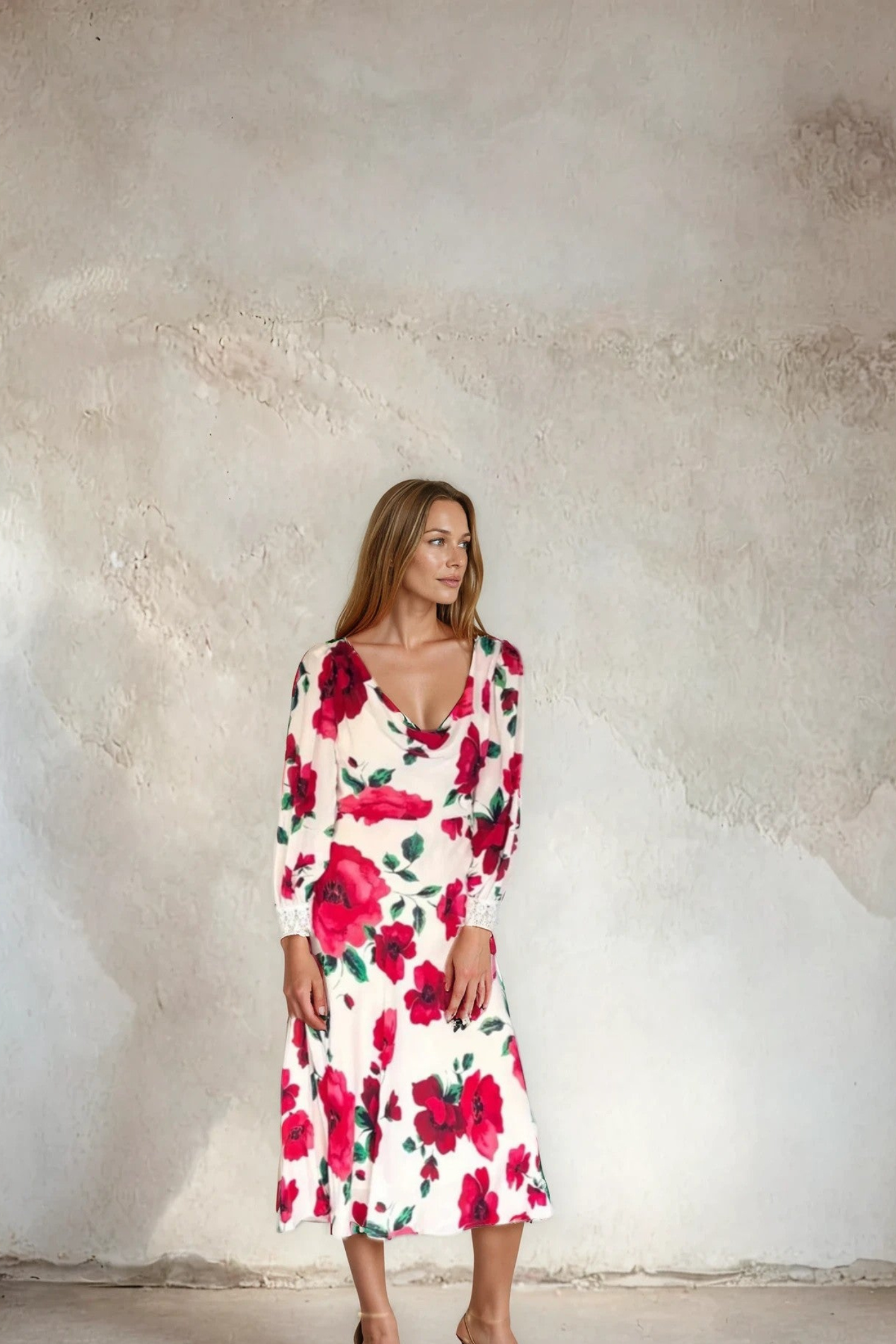 Model wearing Sirens Violet Cream Poppy Dress with long sleeves and vibrant floral print by Sirens. Shop Sirens at Dotique.