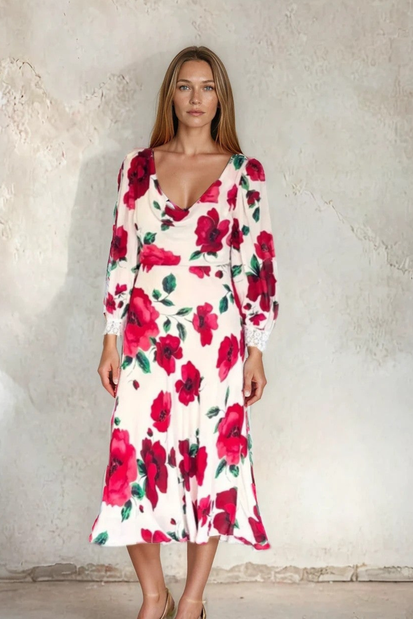 Model wearing Sirens Violet Cream Poppy Dress with long puff sleeves and vibrant floral print by Sirens. Shop Sirens at Dotique.