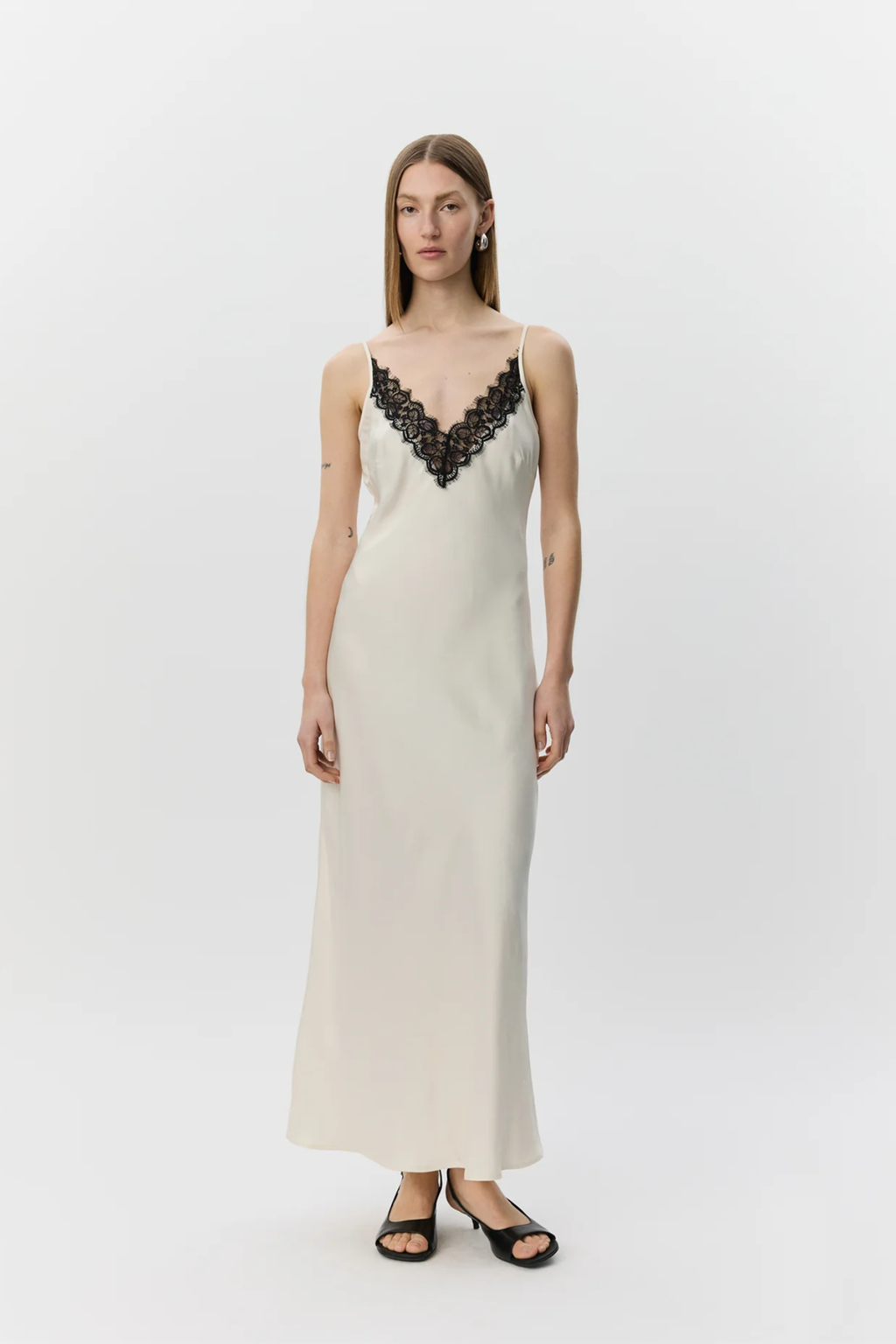 Model wearing Sofie Schnoor Bettsw Cream Satin Slip Dress S262306 by Sofie Schnoor, shop Sofie Schnoor at Dotique