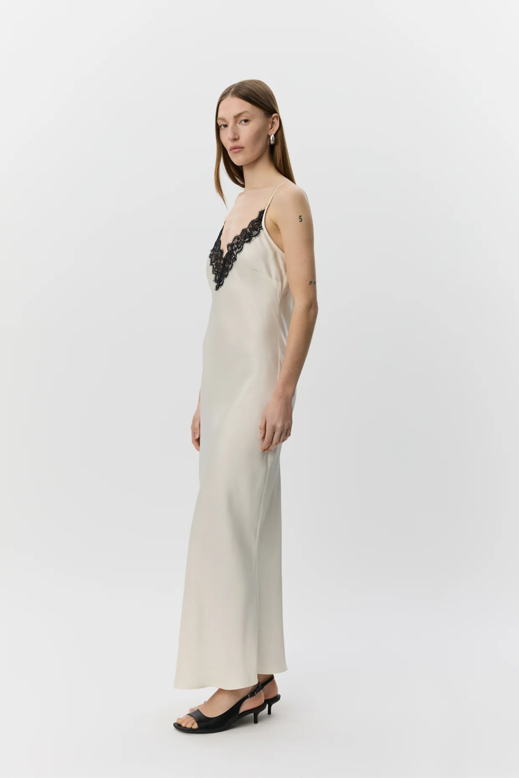 Model wearing Sofie Schnoor Bettsw Cream Satin Slip Dress S262306 by Sofie Schnoor Shop Dotique