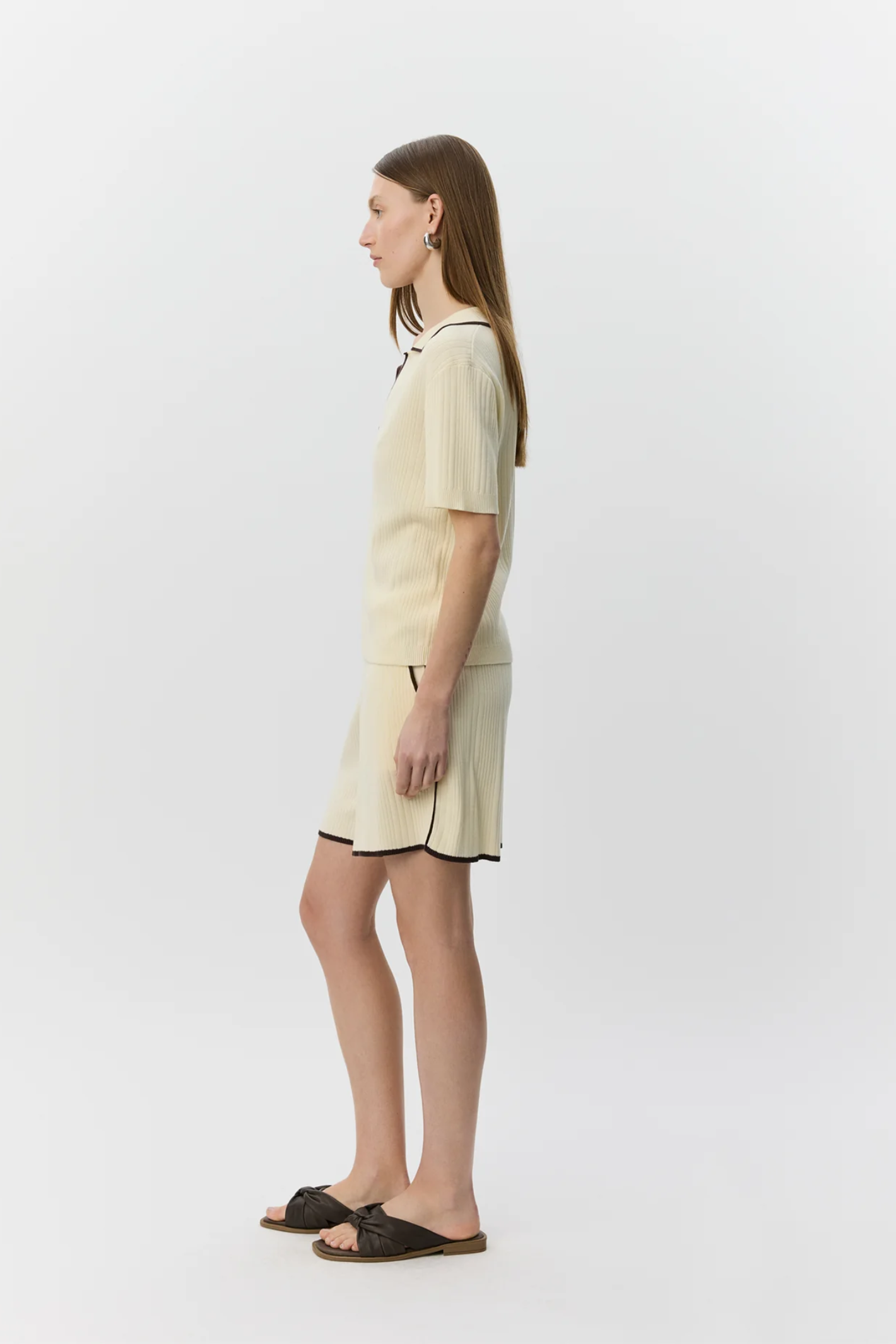 Model wearing Sofie Schnoor Joliesw Knit Shorts S262342 in cream by Sofie Schnoor, shop Sofie Schnoor at Dotique.