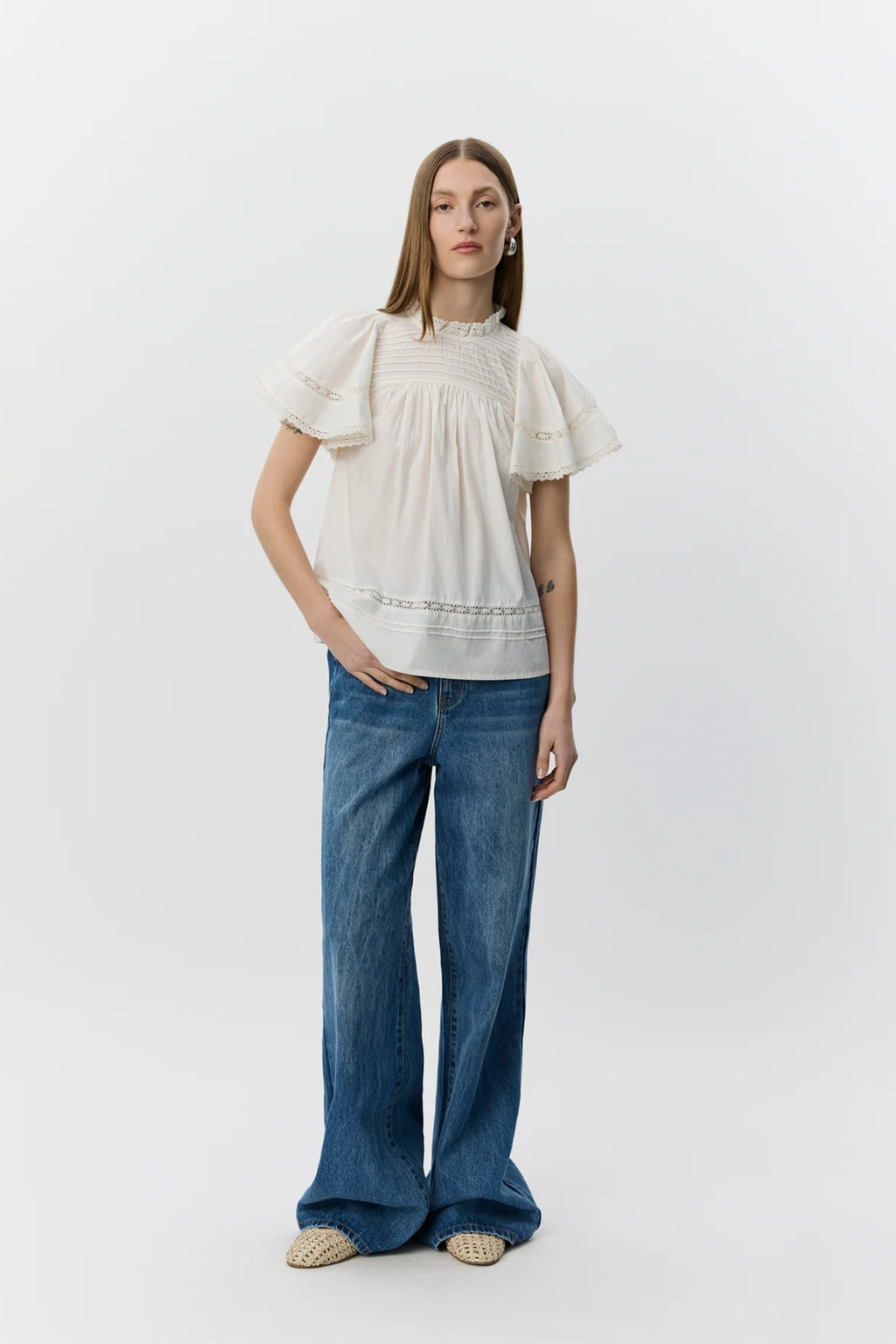 Model wearing Sofie Schnoor Lilousw Light Cotton Top S262135 by Sofie Schnoor, shop Sofie Schnoor at Dotique.