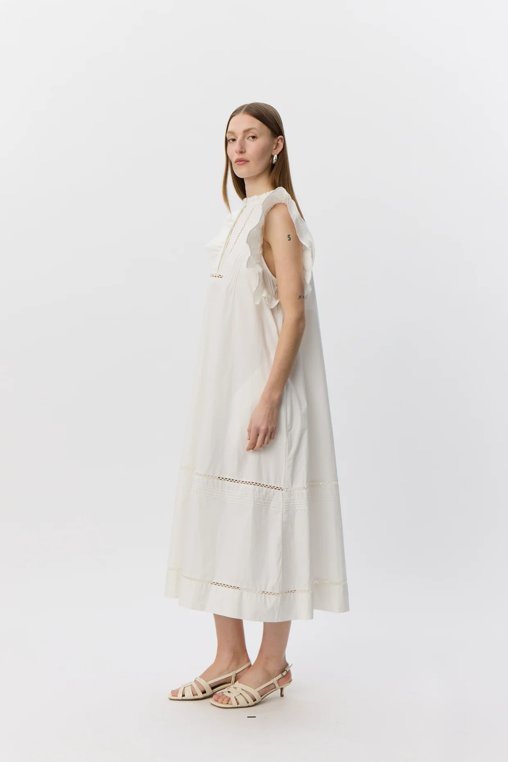 Model wearing Sofie Schnoor Otaniasw Frill Cotton Dress S262147 by Sofie Schnoor, shop Sofie Schnoor at Dotique.