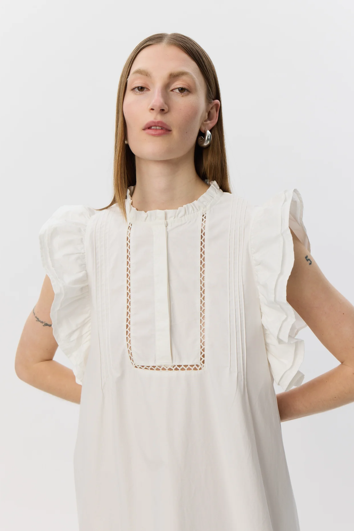 Model wearing Sofie Schnoor Otaniasw Frill Cotton Dress S262147 by Sofie Schnoor, shop Sofie Schnoor at Dotique