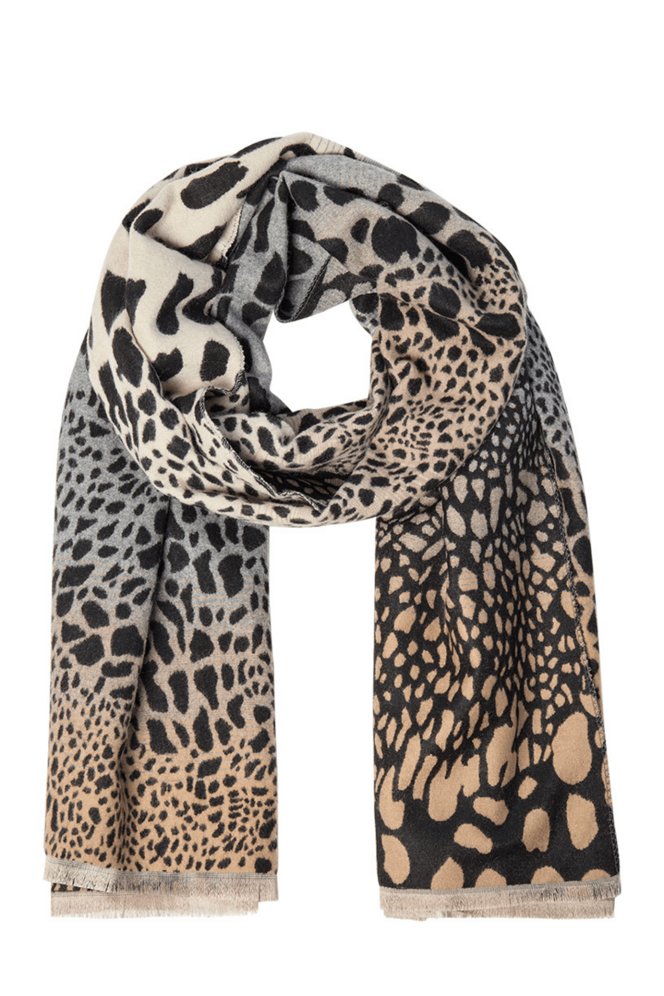 SC-VOISA 1 scarf is crafted from a blend of 60% polyester and 40% viscose. It features an eye-catching animal print with a soft texture and delicate fringe edges. Available at Dotique