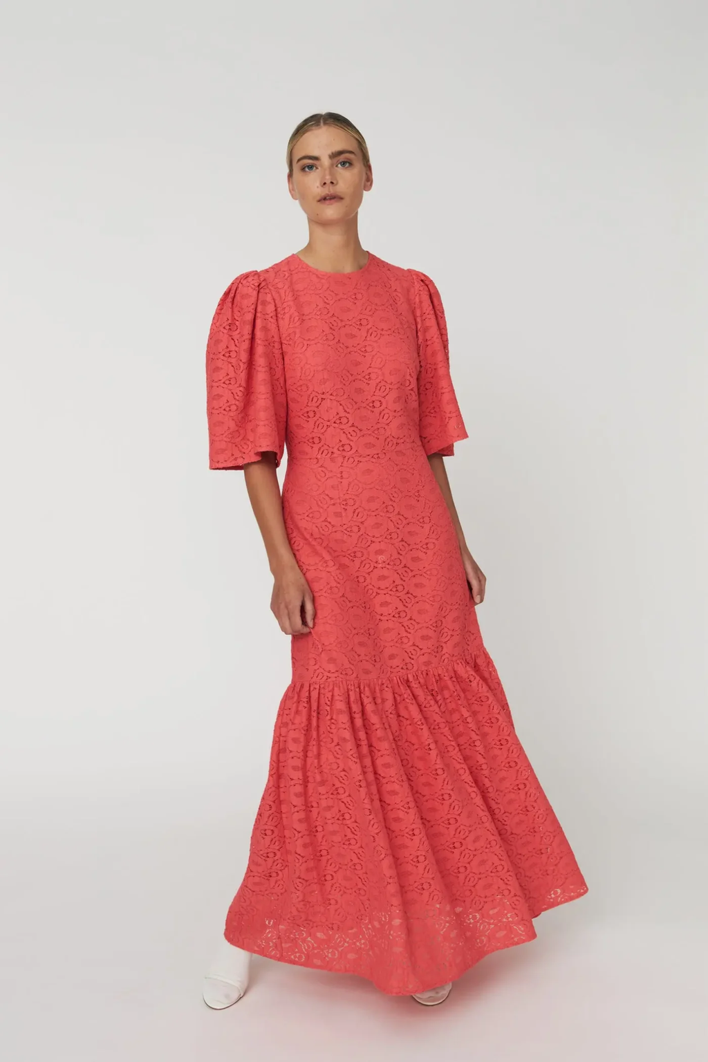 Model wearing Stella Nova Cotton Lace Maxi Dress CL61-4417 in coral with puff sleeves by Stella Nova shop at Dotique