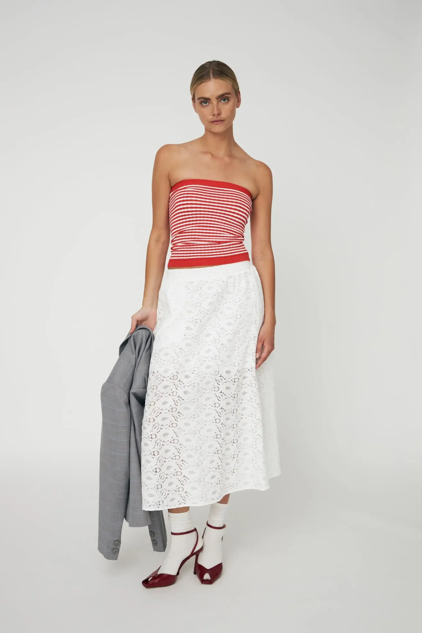 Model wearing Stella Nova Cotton Lace Skirt CL61-5361 in white by Stella Nova shop available at Dotique front view