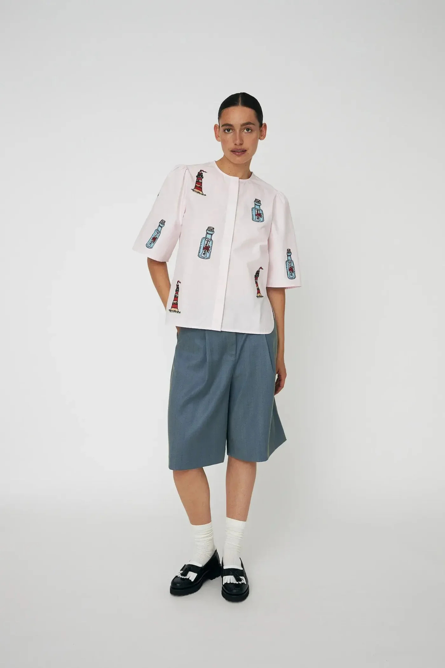 Model wearing Stella Nova Embroidered Bow Shirt Pale Pink with embroidered motifs by Stella Nova shop at Dotique gallery 1