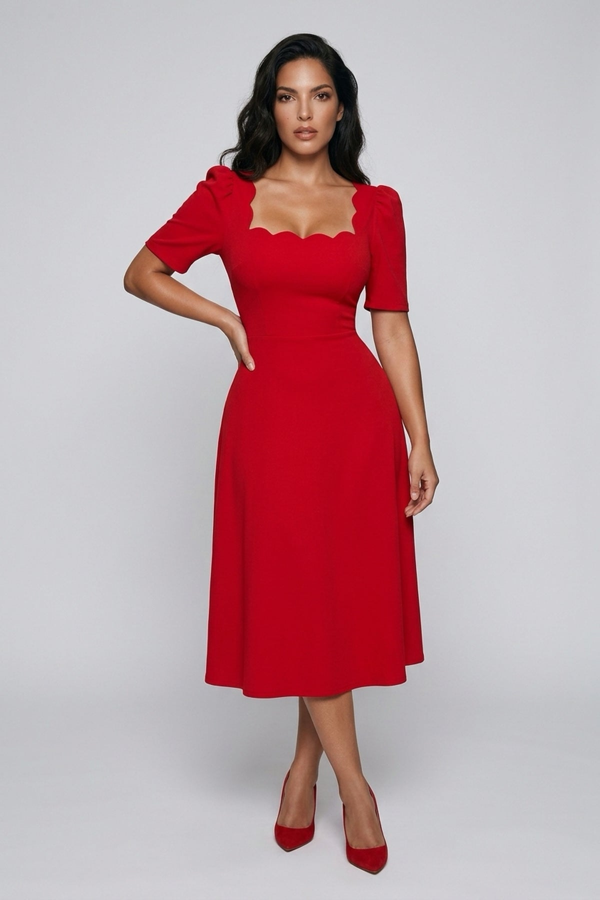 Front view of a model wearing The 8th Sign Livia scallop midi dress in red