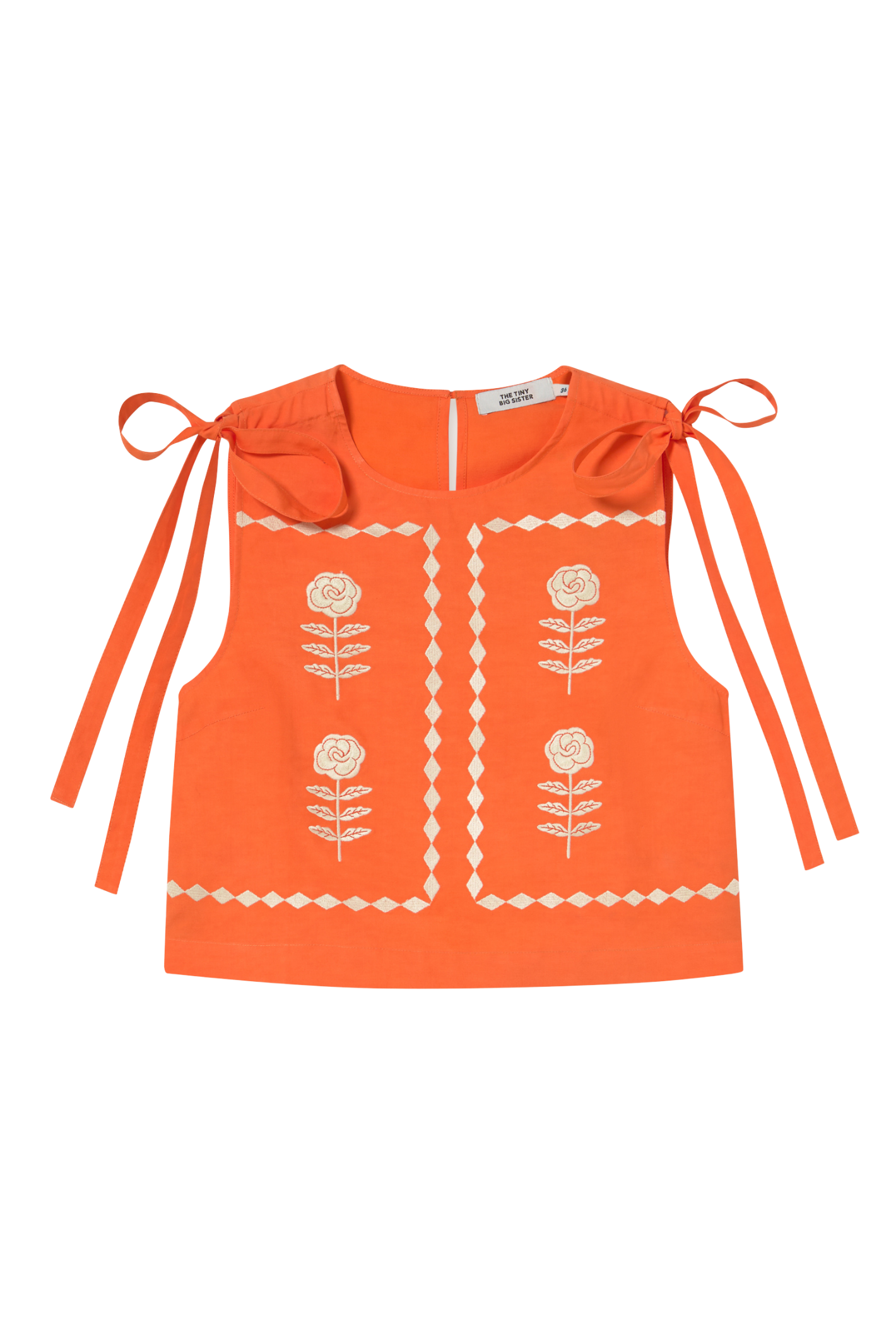 Tiny Big Sister embroidered top in a soft cotton, viscose and linen blend. A beautiful statement piece for everyday wear. Shop at Dotique.