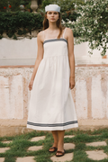 Tiny Big Sister strappy dress in a breathable cotton, viscose and linen blend. Light, flattering and perfect for summer. Shop at Dotique.