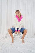 TWNS The Label Breckenridge II off white and neon pink trucker neck jumper with silver zip fastening. Shop now at Dotique.