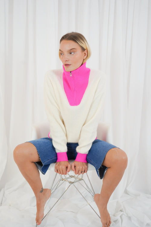 TWNS The Label Breckenridge II off white and neon pink trucker neck jumper with silver zip fastening. Shop now at Dotique.