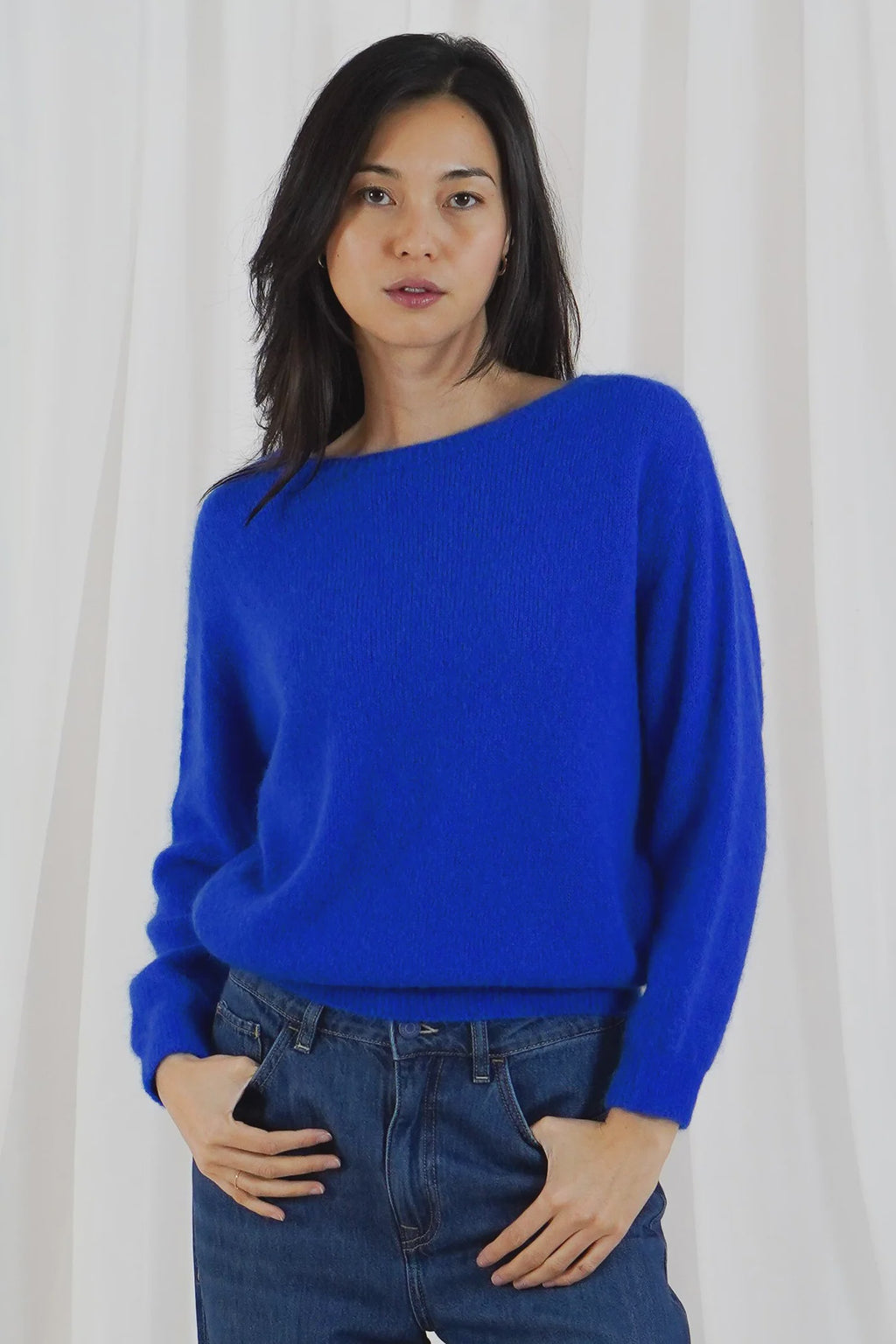 TWNS The Label Sanibel electric blue boat neck jumper with a relaxed fit and long sleeves.