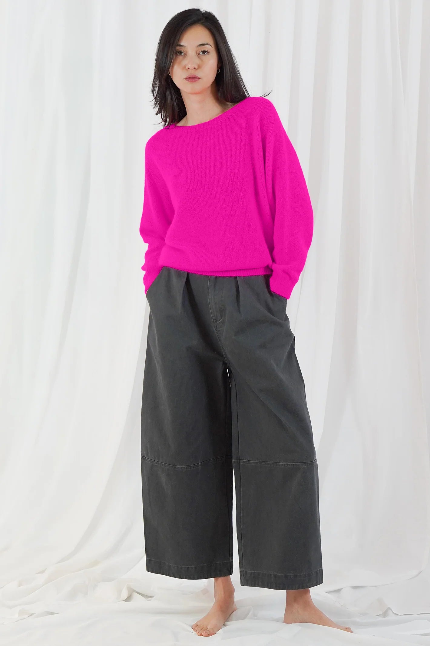 TWNS The Label Sanibel Fire boat neck jumper in a vibrant coral-red with a relaxed fit and long sleeves.