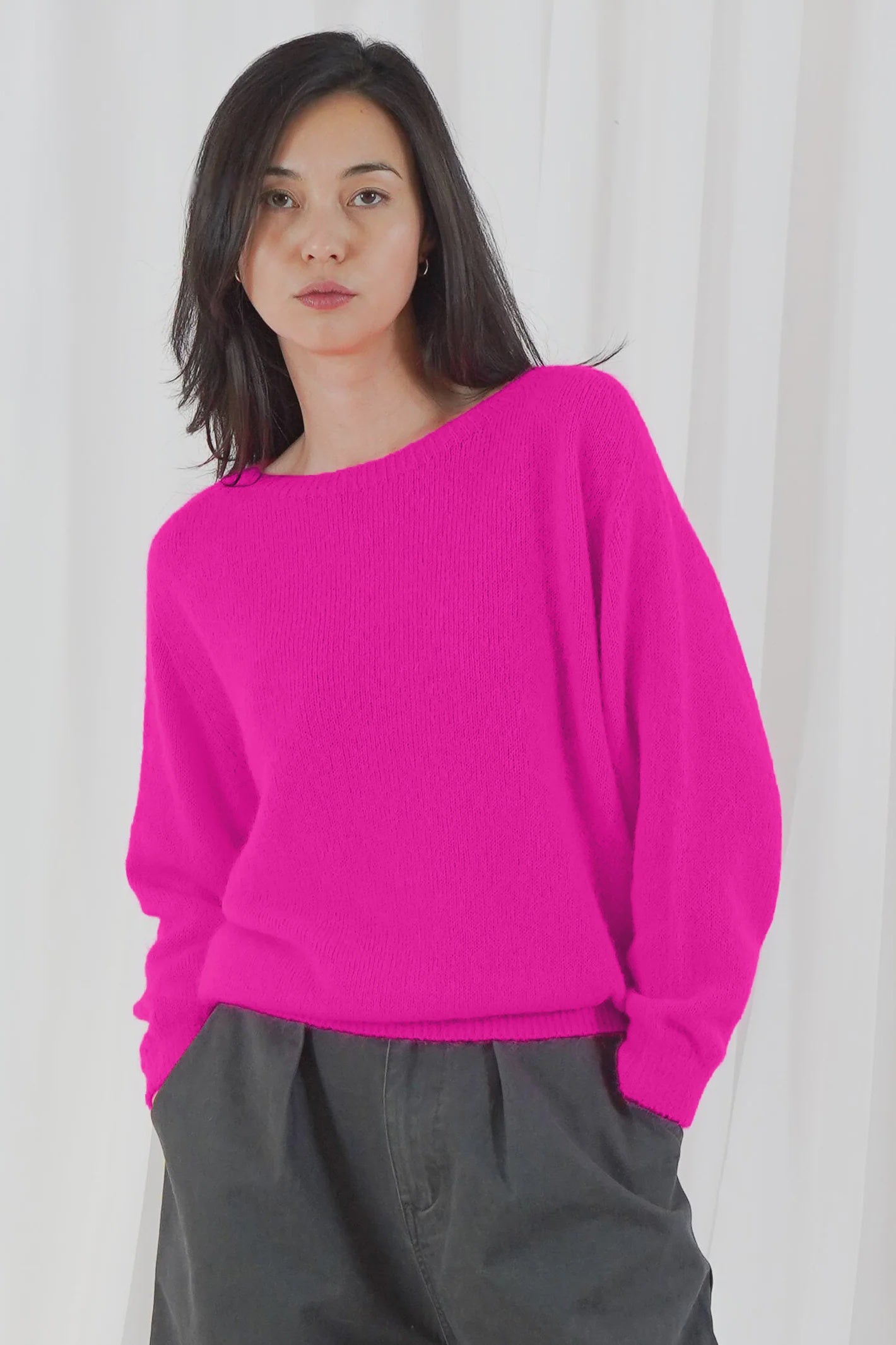 TWNS The Label Sanibel Fire boat neck jumper in a vibrant coral-red with a relaxed fit and long sleeves.