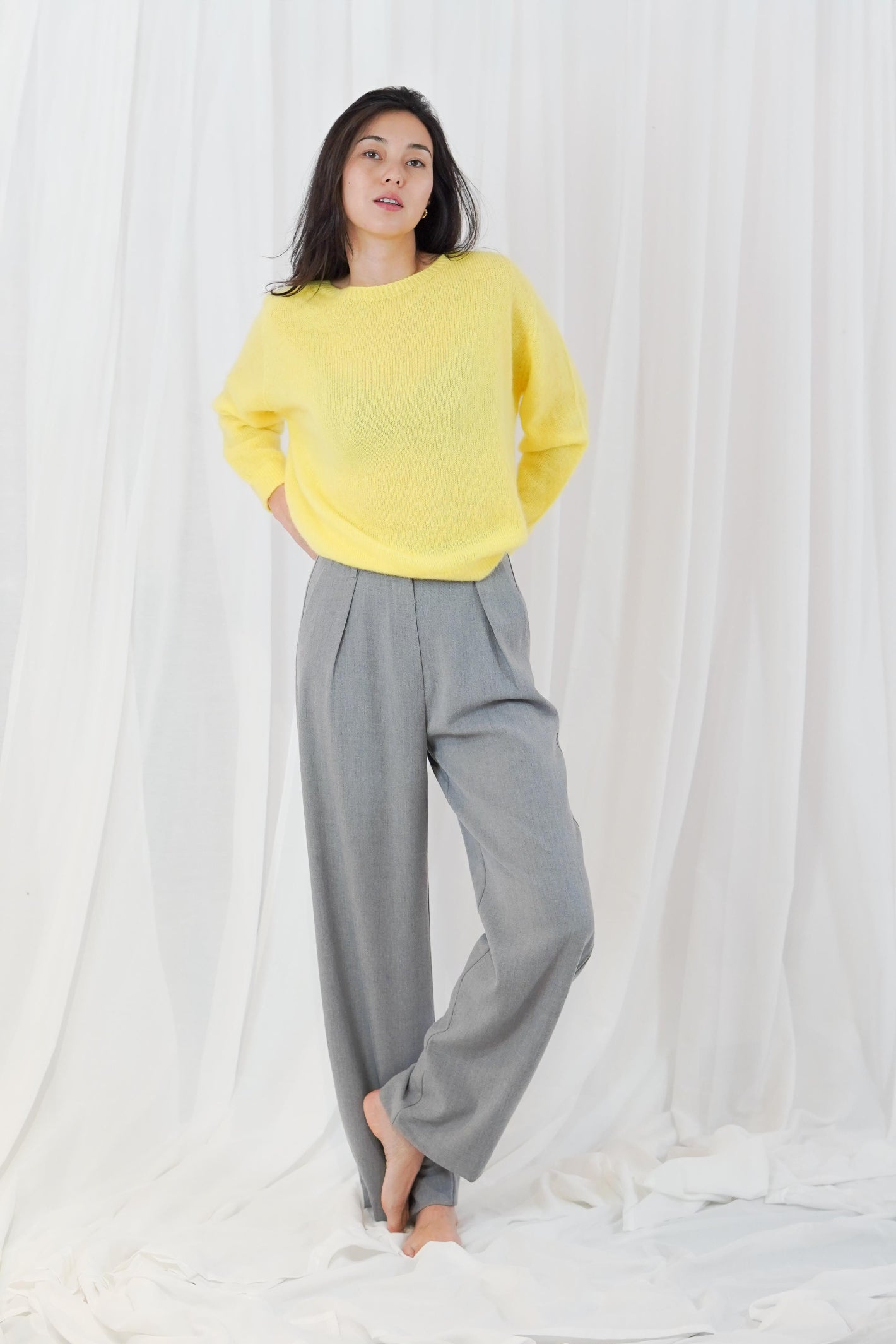 TWNS The Label Sunrise sunrise yellow crew neck jumper with a relaxed fit and long sleeves.