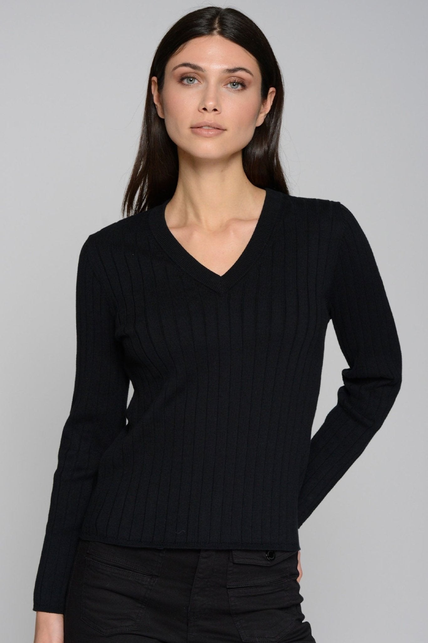 Model wearing a black ribbed V-neck Vilagallo 31961 Black Button Sleeve Jumper by Vilagallo, shop Vilagallo at Dotique