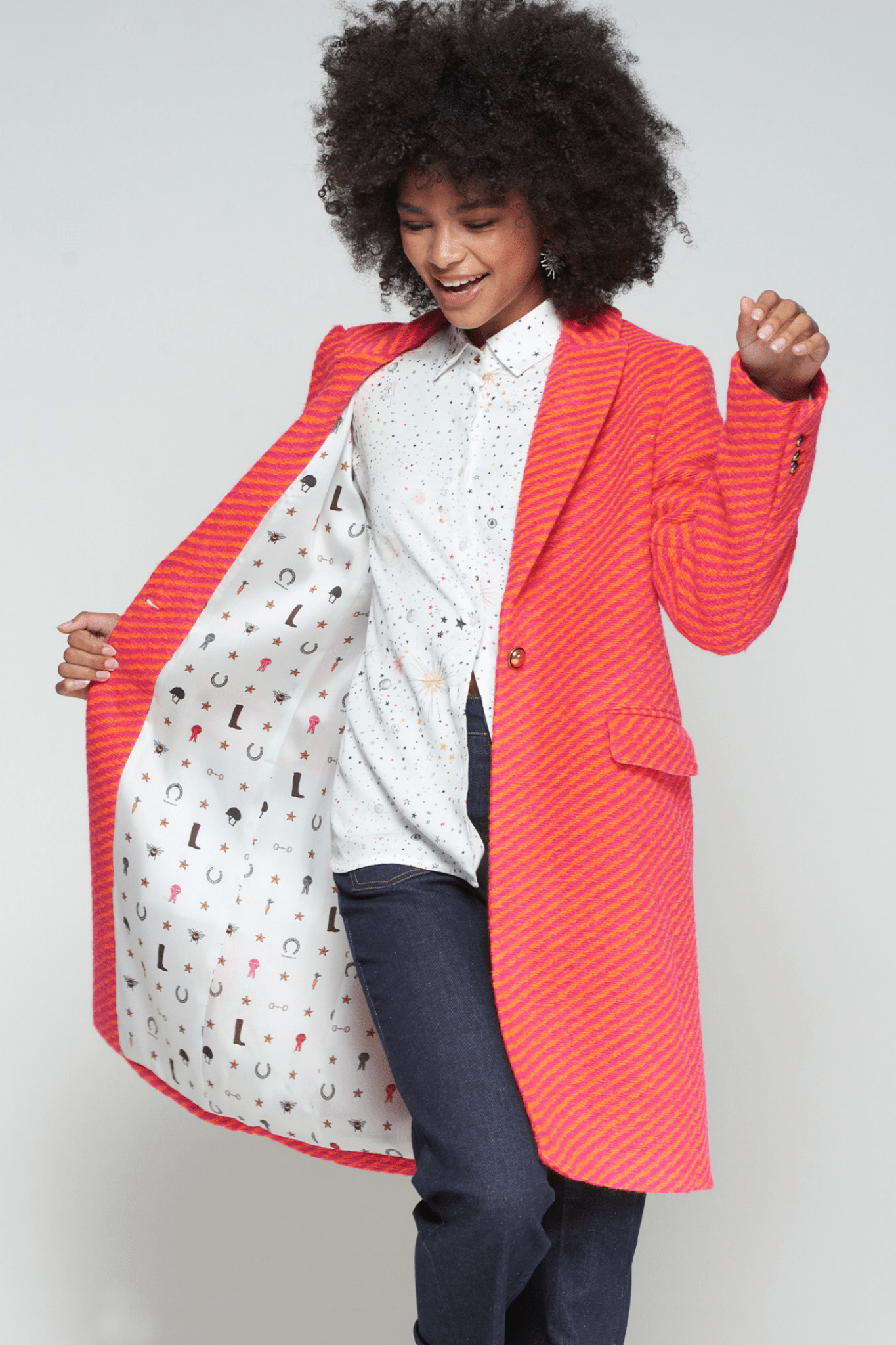 Vilagallo 32833 Orange & Pink Stripe Coat with Printed Lining by Vilagallo model showcasing inside lining Shop Vilagallo at Dotique