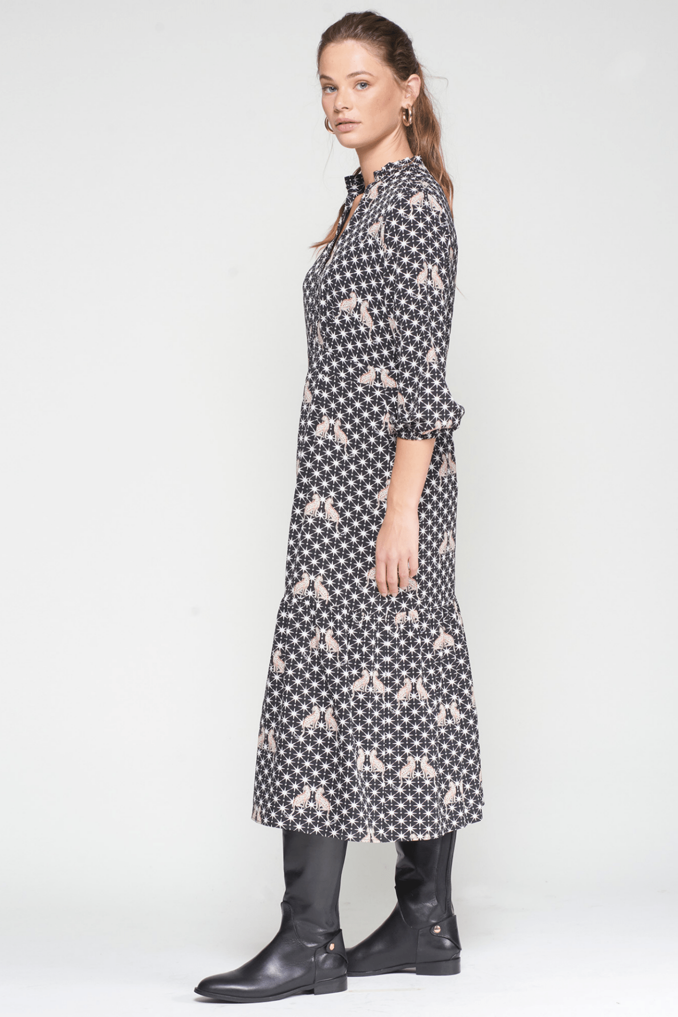 Shop the Vilagallo 33005 Leopard Print Midi Dress by Vilagallo at Dotique, styled with black boots.