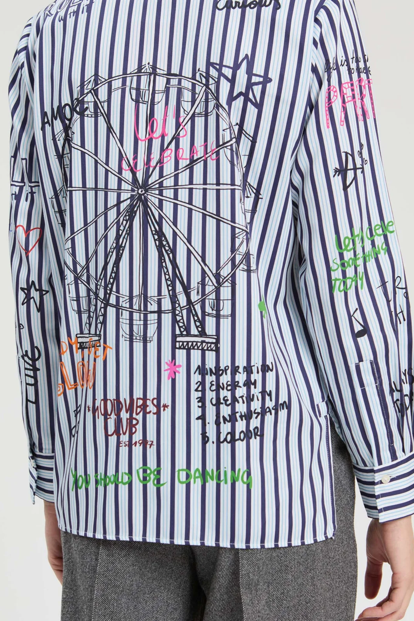 Shop the Vilagallo Striped Ferris Wheel Print Shirt at Dotique. A classic striped shirt with an exclusive illustrated print, bringing a playful twist to everyday tailoring.