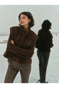 Yaya 02-029012-610 Reversible Gilet Suede and Fur Cocoa Brown worn in snow. Shop YAYA at Dotique